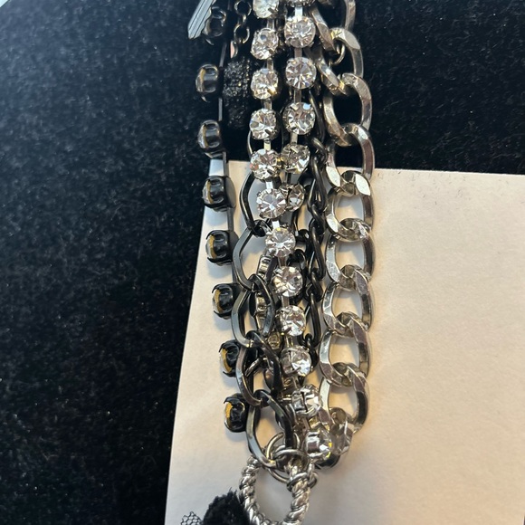 Betsey Johnson Chain/Charm bracelet
Silvertone/black/rhinestones 
Skull Key logo - Picture 11 of 11